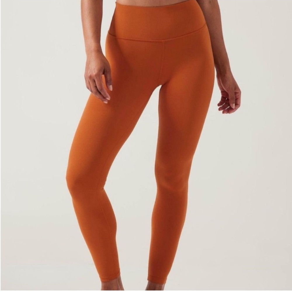Athleta Salutation Stash legging (full) - burnt orange - large